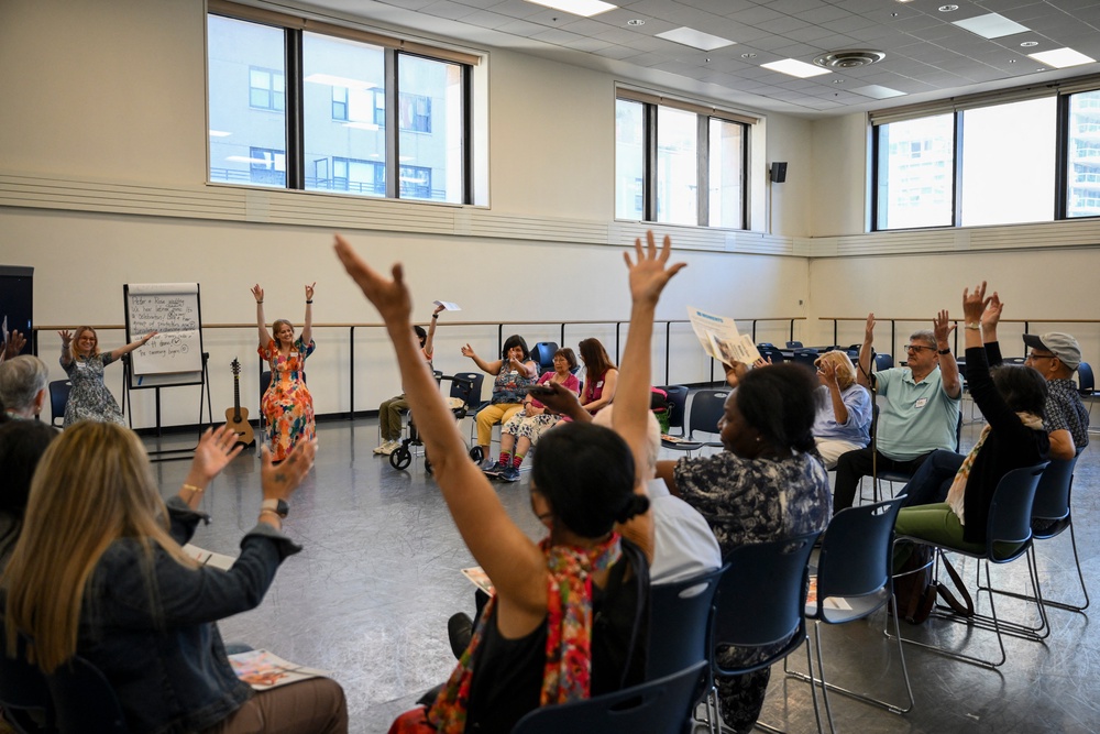 Attendees participate in 
