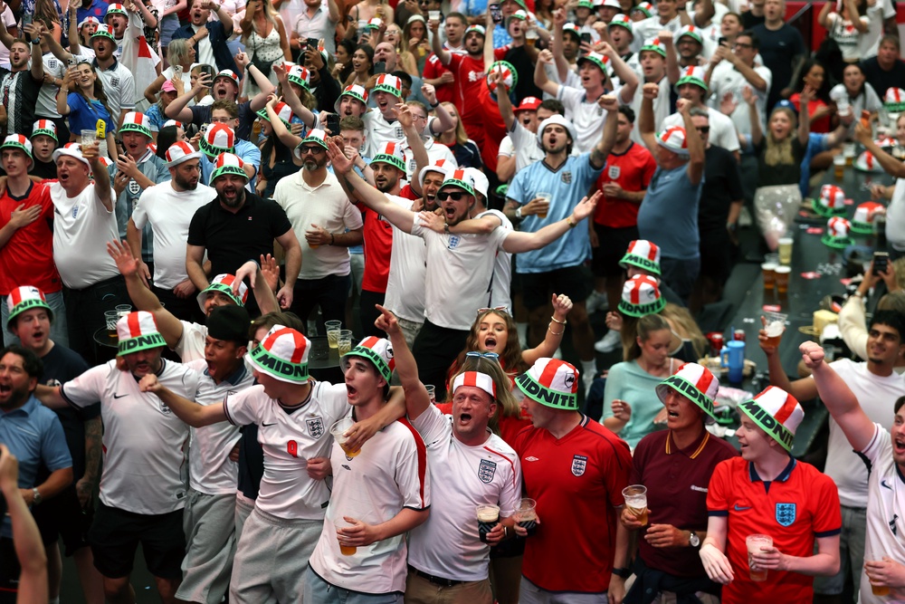 Fans watch a screening of the World Cup match between England and DR Congo (Steven Paston/PA) (PA Wire)