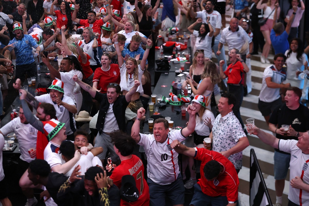 Fans watching England v Congo DR at BOXPark Wembley (PA)
