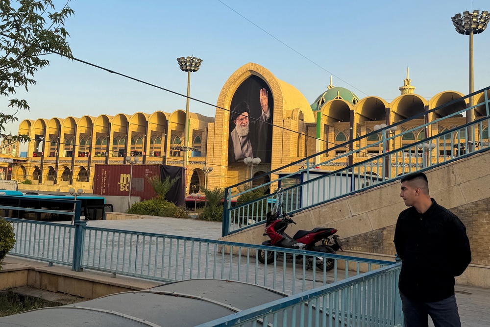 A man stands near the Grand Mosalla in Tehran on July 3, 2026, ahead of Iran's slain supreme leader Ali Khamenei's funeral. (AFP/Getty)