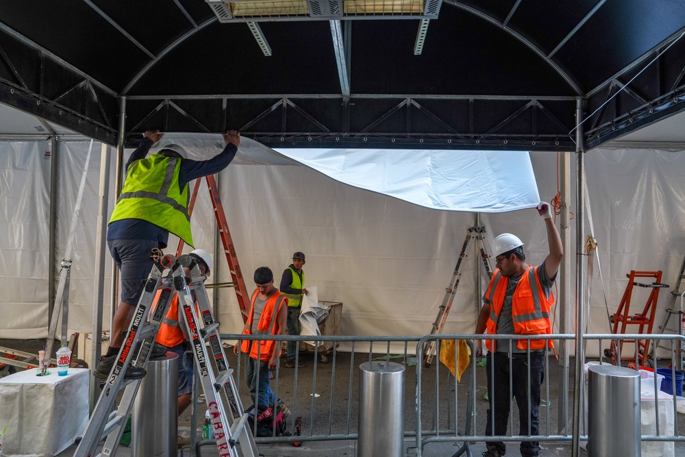 Workers set up a tent outside Madison Square Garden ahead of the reported wedding between Taylor Swift and Travis Kelce (Ryan Murphy/AP) (AP)