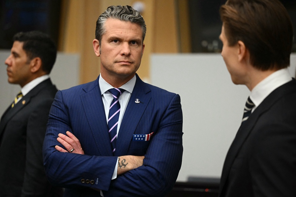 Pete Hegseth planned to announce further cuts to the US presence in Europe (pictured in October) (AFP/Getty)