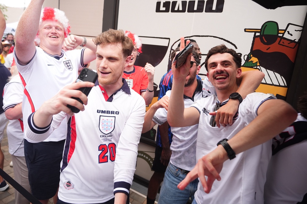 Jubilant England fans celebrating at a bar in Atlanta, Georgia, following England’s victory against DR Congo (James Manning/PA) (PA Wire)