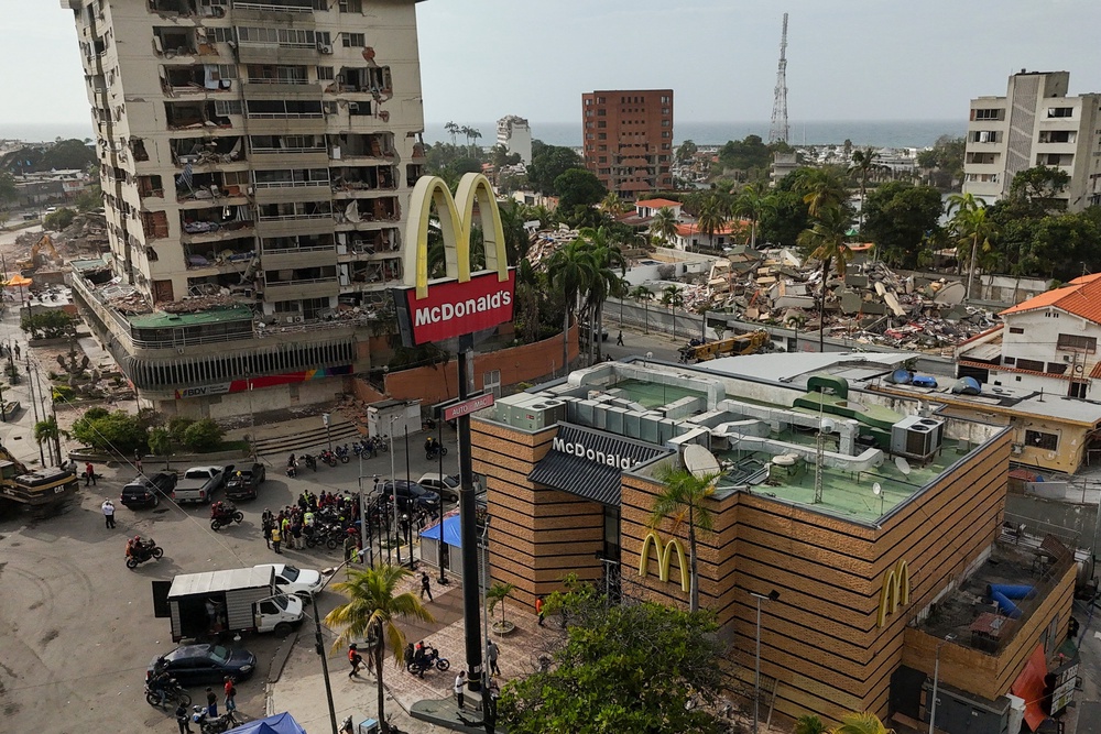 A McDonald's restaurant is being used as a temporary health center and pet reunification center after the earthquakes that struck La Guaira (AP Photo/Matias Delacroix)