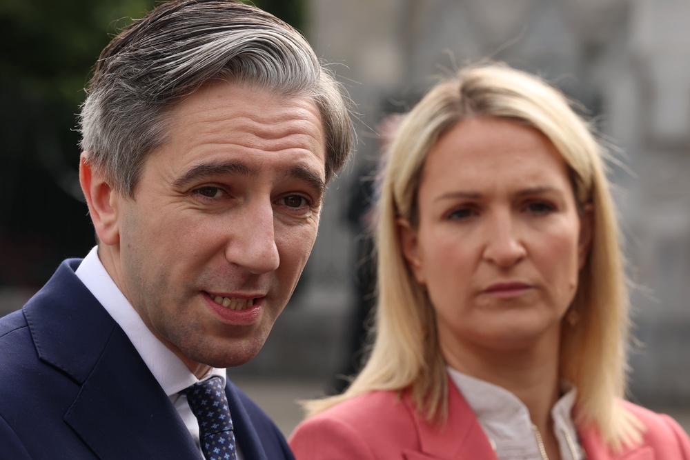 Tanaiste Simon Harris (left) and Irish Minister for Foreign Affairs Helen McEntee speaking to members of the media at University College Cork (Liam McBurney/PA) (PA Wire)