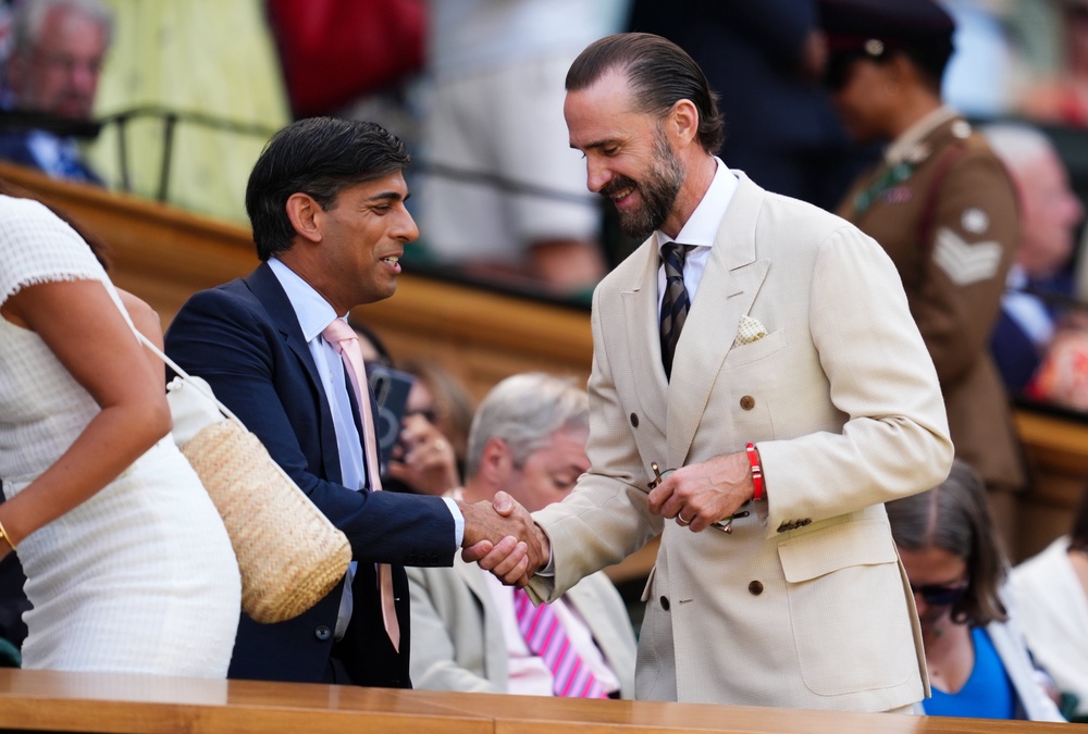 Joseph Fiennes shakes hands with Rishi Sunak in the royal box (Adam Davy/PA) (PA Wire)