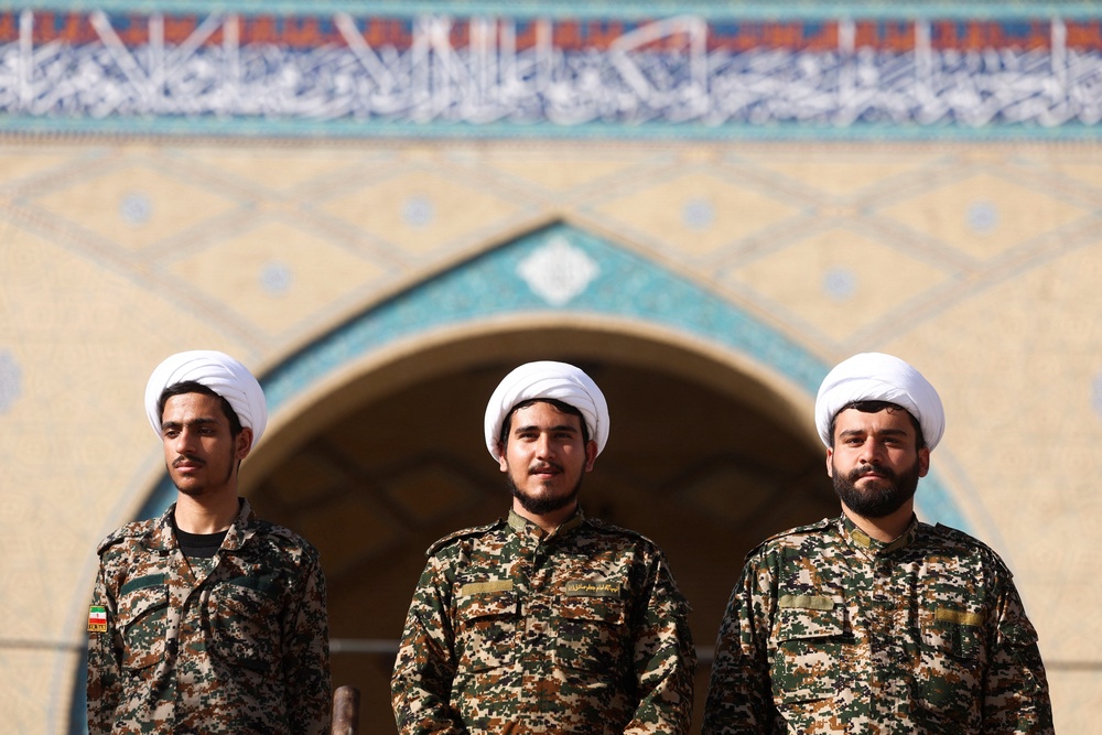 Members of Basij paramilitary forces stand guard outside the Imam Khomeini Grand Mosalla, on the day international delegates participate in a farewell ceremony for Iran's late Supreme Leader Ayatollah Ali Khamenei, who was killed on February 28 during Israeli and U.S. airstrikes on Iran, in Tehran, Iran, July 3, 2026. (Reuters)