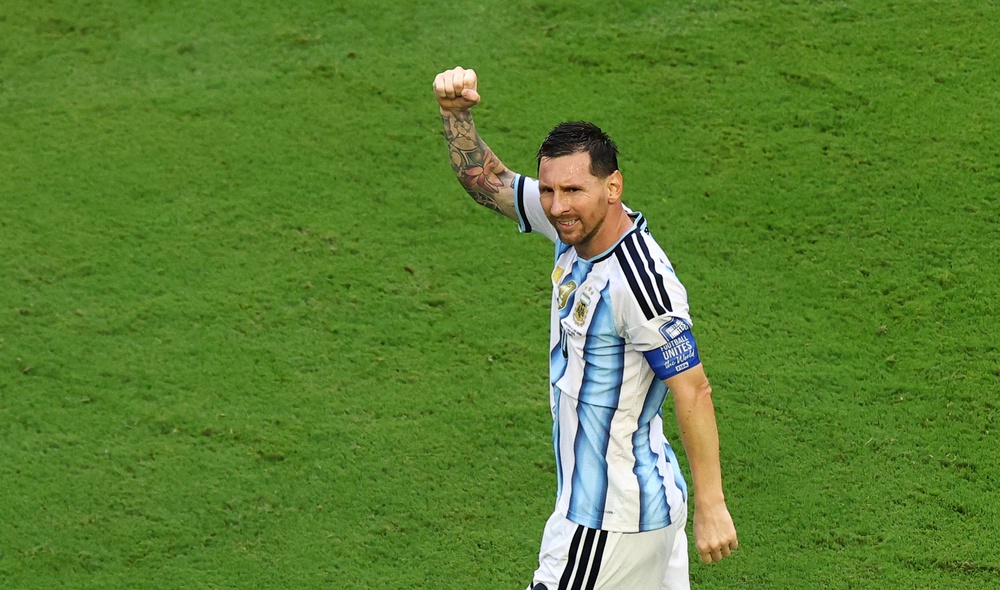 Argentina's Lionel Messi celebrates scoring their first goal (Reuters)