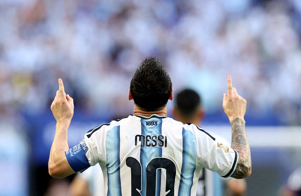 Argentina's Lionel Messi celebrates scoring their first goal (Reuters)