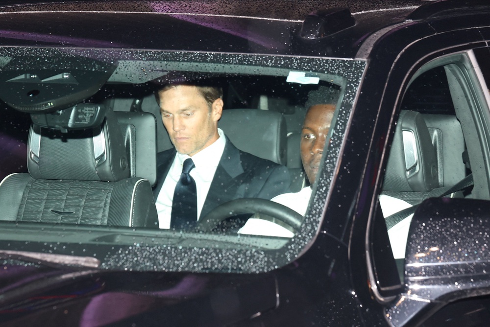Tom Brady sits in a vehicle outside Madison Square Garden (Reuters)