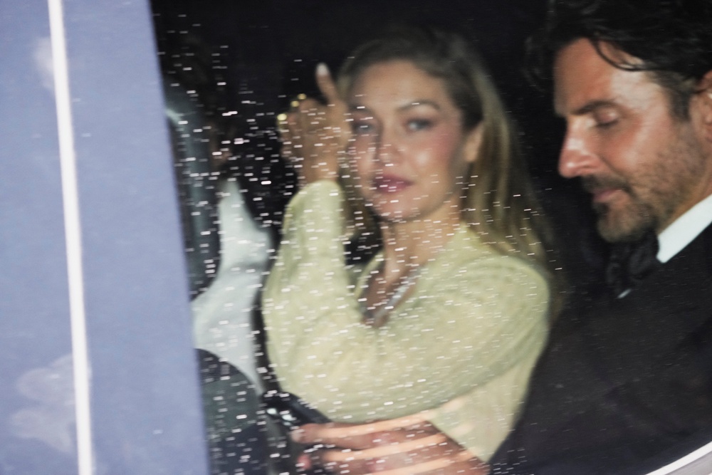 Bradley Cooper and Gigi Hadid leaving Taylor and Travis’s wedding celebrations (Reuters)