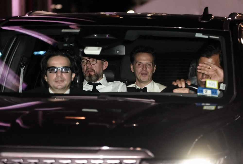 Andrew Scott leaves the wedding (Reuters)