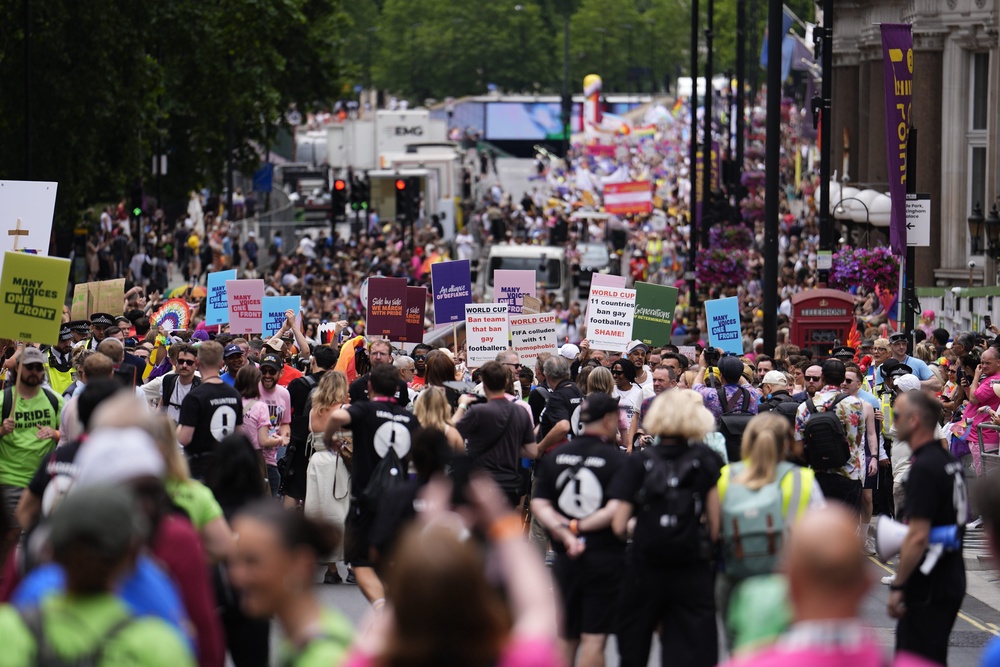 People with placards during the Pride in London parade in central London (Jordan Pettitt/PA) (PA Wire)