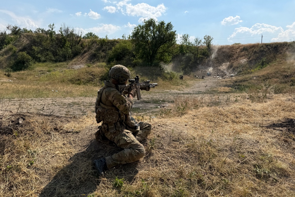 A French volunteer member from the Revanche Tactical Group, which operates under the International Legion of the Defence Intelligence of Ukraine, fires at a target as he takes part in a military training at an undisclosed location, in the Zaporizhzhia region, on July 3, 2026, amid the Russian invasion of Ukraine. (AFP/Getty)