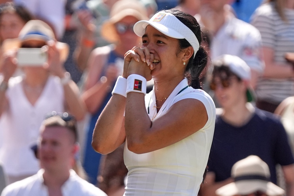 Eala dedicated her victory to the people of the Philippines after beating Iga Swiatek on Centre Court (AP)
