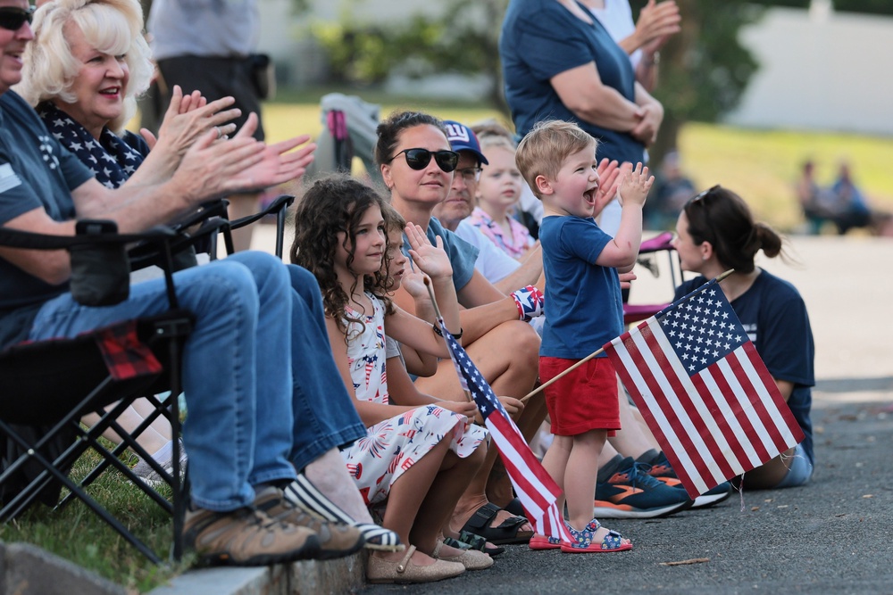 People attend a July Fourth Parade along the Walkway of Heroes and Independence Avenue in Tappan, New York (Photo by Michael M. Santiago/Getty Images)