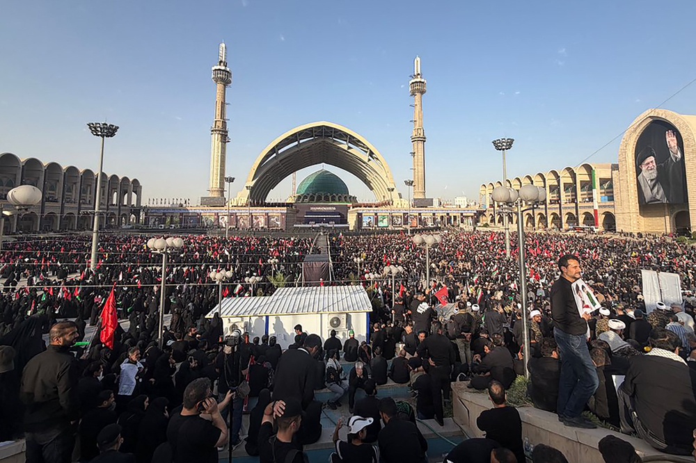 Mourners gather at the Grand Mosalla to pay their final respects to Iran's slain supreme leader Ayatollah Ali Khamenei at the start of his funeral ceremonies (AFP via Getty Images)