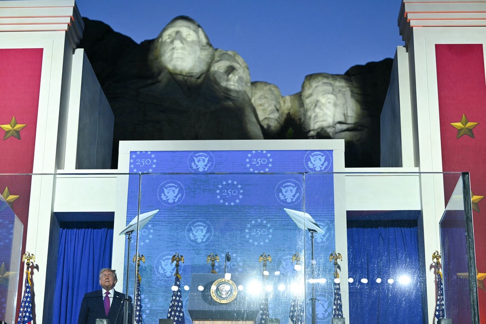 US President Donald Trump steps on stage to deliver remarks during the Independence Day events at Mount Rushmore (AFP via Getty Images)