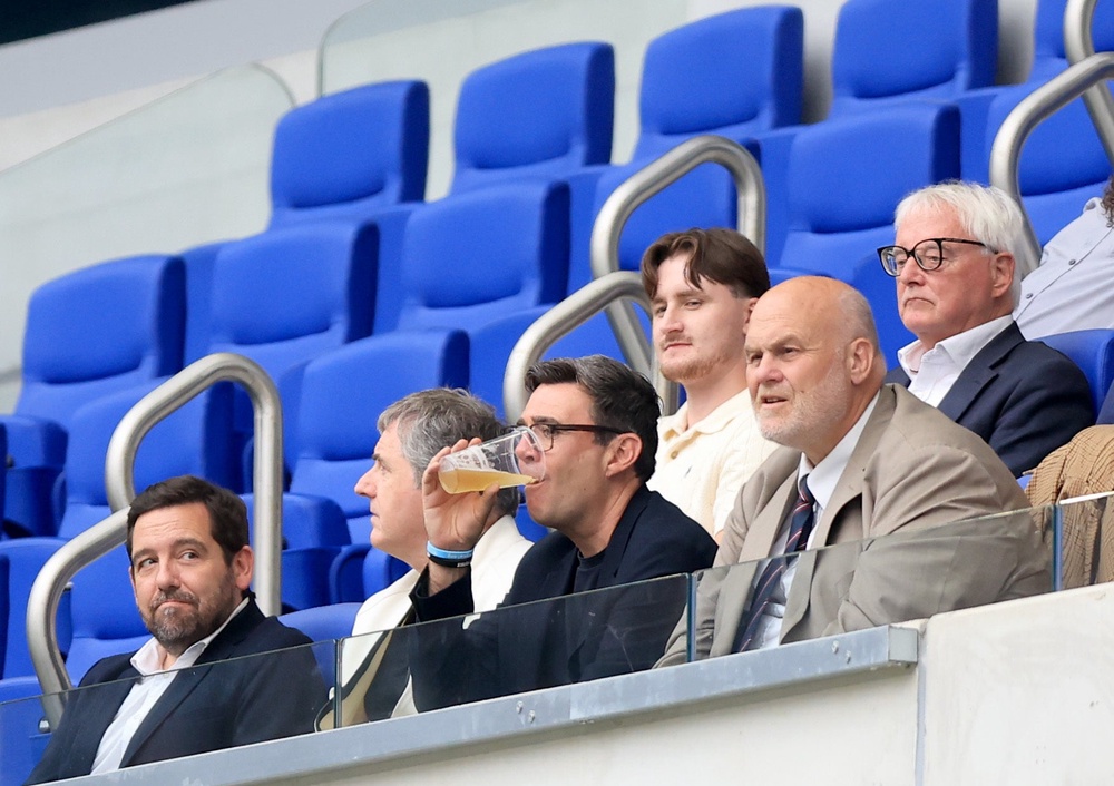 Andy Burnham was able to have a beer watching rugby league (Nigel French/PA) (PA Wire)