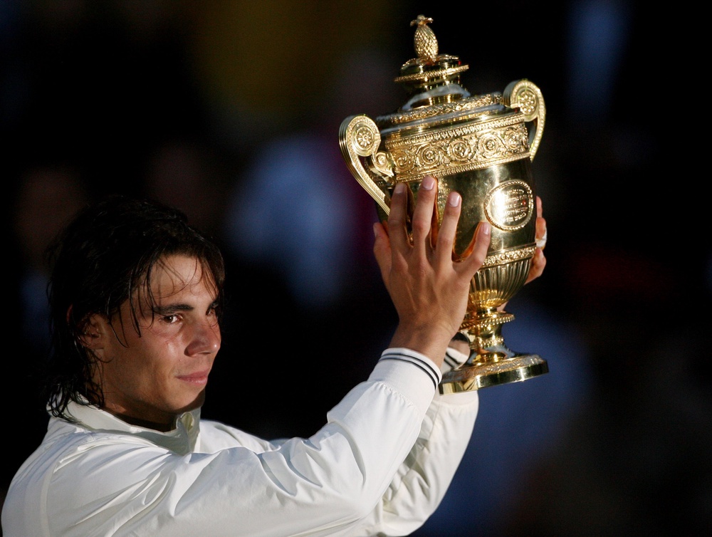 Rafael Nadal won the Wimbledon title for the first time with victory in the final over Roger Federer (Lewis Whyld/PA) (PA Archive)