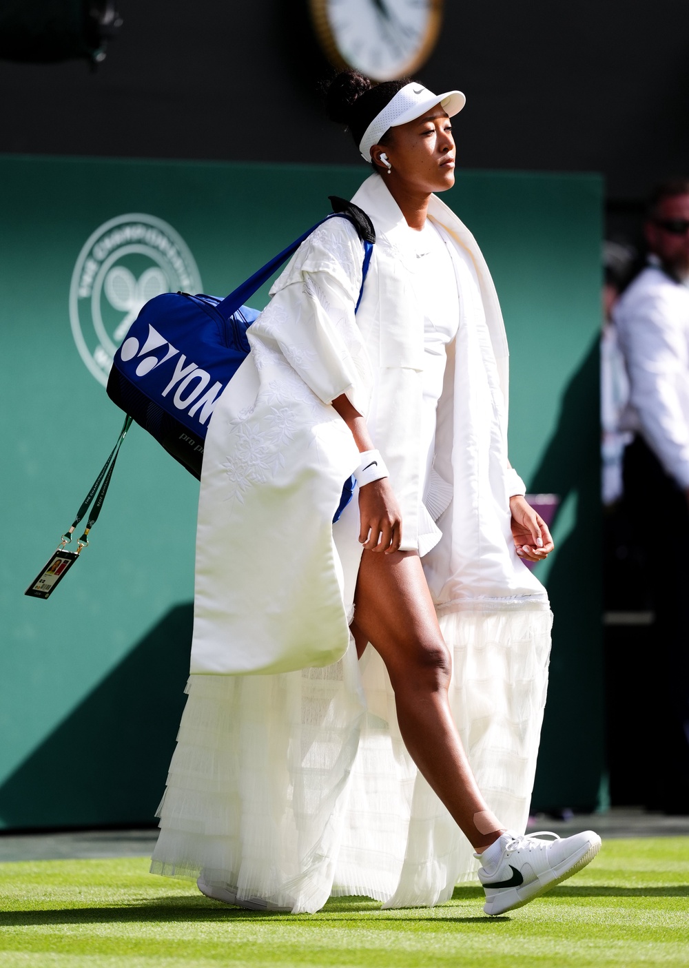 Naomi Osaka walks onto Centre Court (John Walton/PA) (PA Wire)