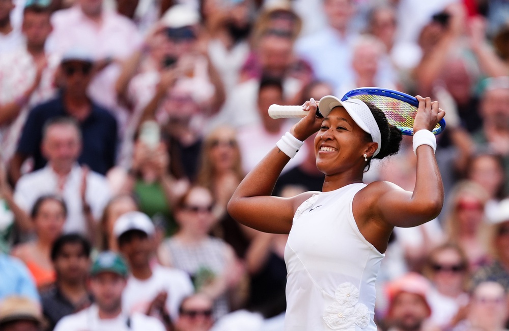 Naomi Osaka smiles after beating Aryna Sabalenka (John Walton/PA) (PA Wire)