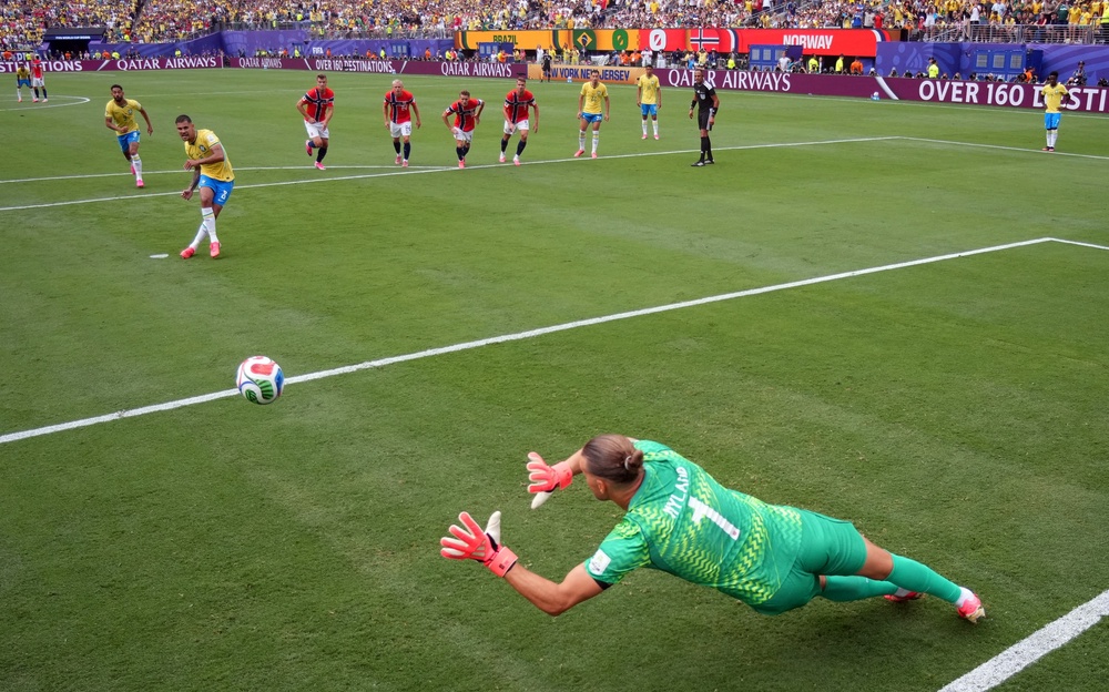 Norway's Orjan Nyland saves a penalty missed by Brazil's Bruno Guimaraes (Reuters)