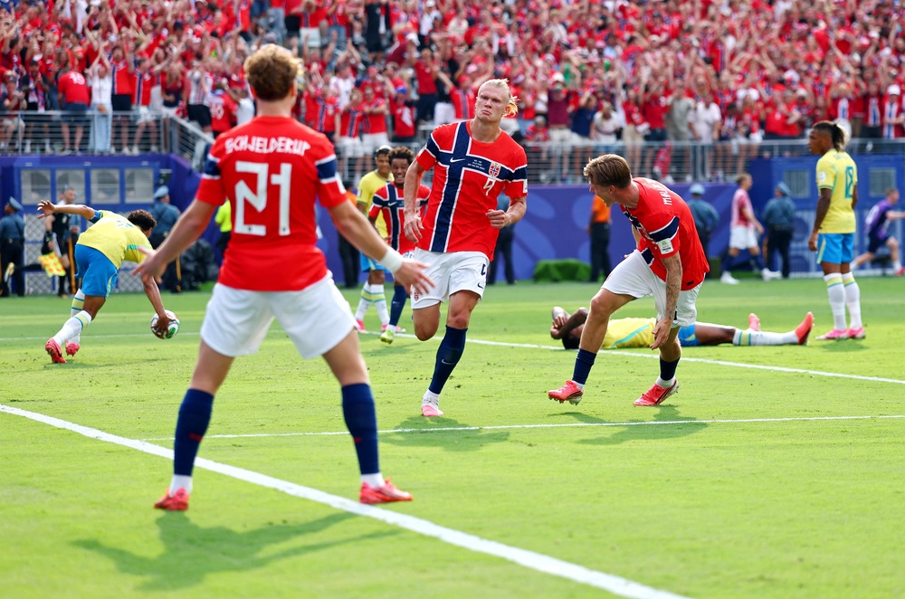 Erling Haaland heads home Norway’s opener (Reuters)