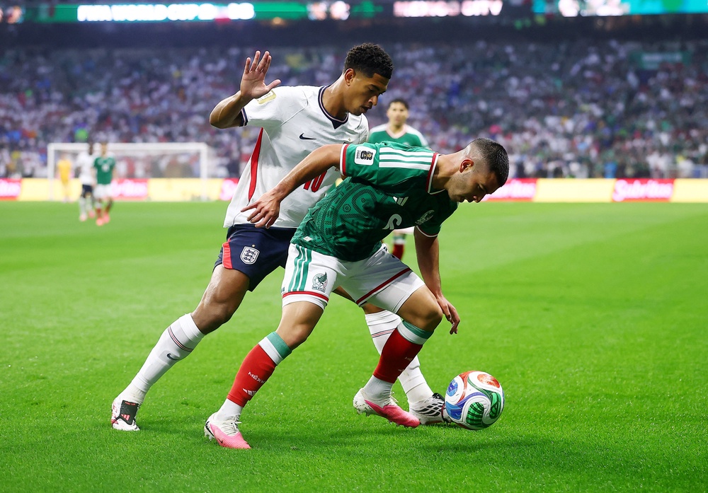 Mexico's Erik Lira in action with England's Jude Bellingham (Reuters)