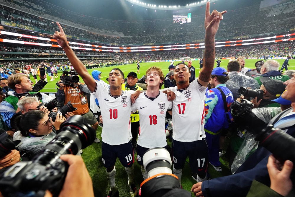 England's Jude Bellingham (left), Anthony Gordon and Morgan Rogers (right) celebrate (PA)