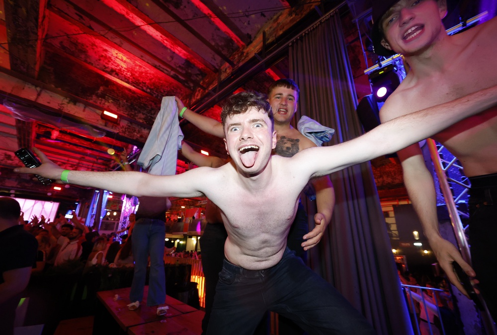 England fans celebrate victory during a screening of the Fifa World Cup match between England and Mexico at Freight Island in Manchester (Cody Froggatt/PA). (PA Wire)