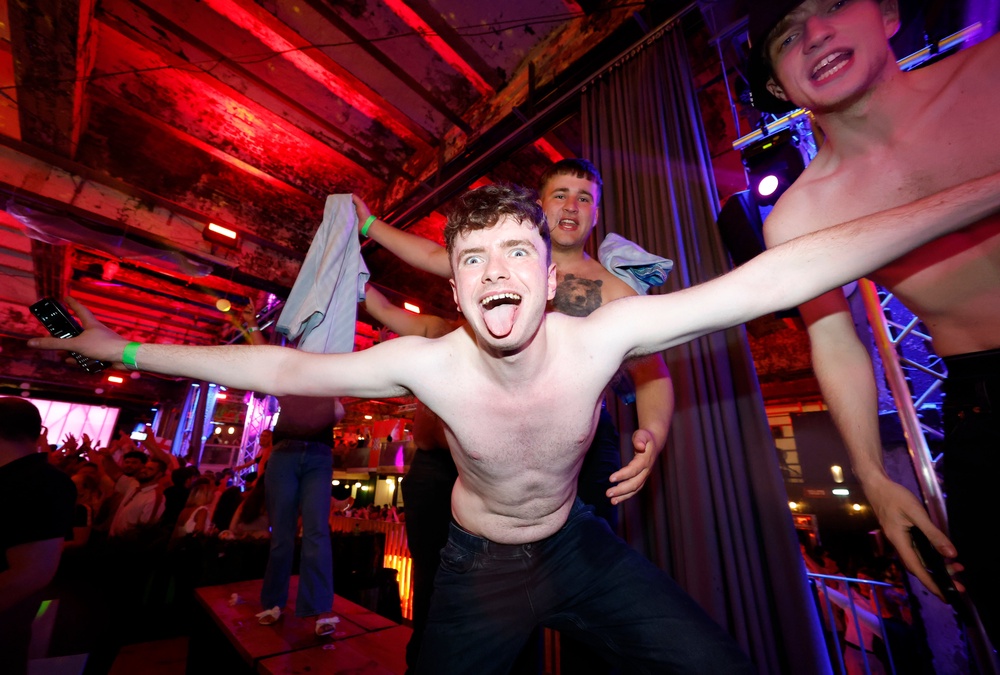 England fans celebrate victory during a screening of the Fifa World Cup match between England and Mexico at Freight Island in Manchester (PA)