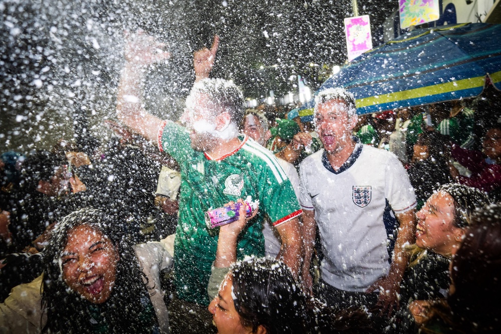 Supporters packed out hundreds of bars and pubs for the late-night clash after the Government extended opening hours to 5am on Monday, with beers flying into the air at the final whistle following 11 minutes of added time. (PA)