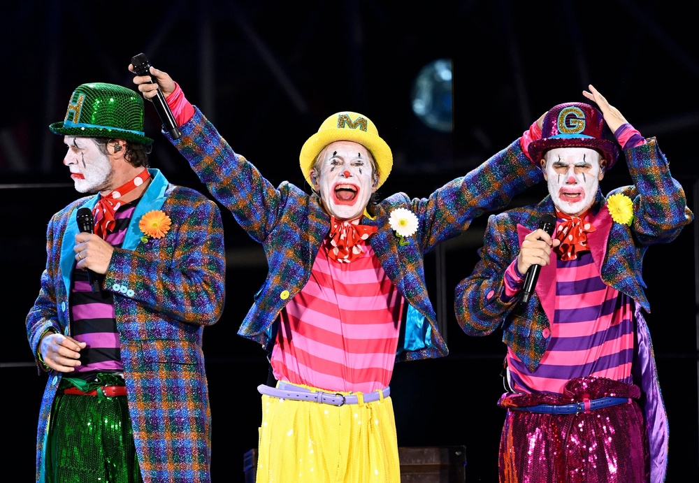 From L-R: Donald, Owen and Barlow on stage at the London Stadium (Getty)