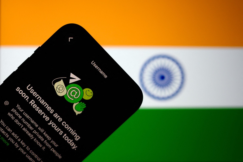The new WhatsApp username feature displayed on a smartphone with the backdrop of India's national flag in New Delhi on 2 July, 2026 (AFP/Getty)