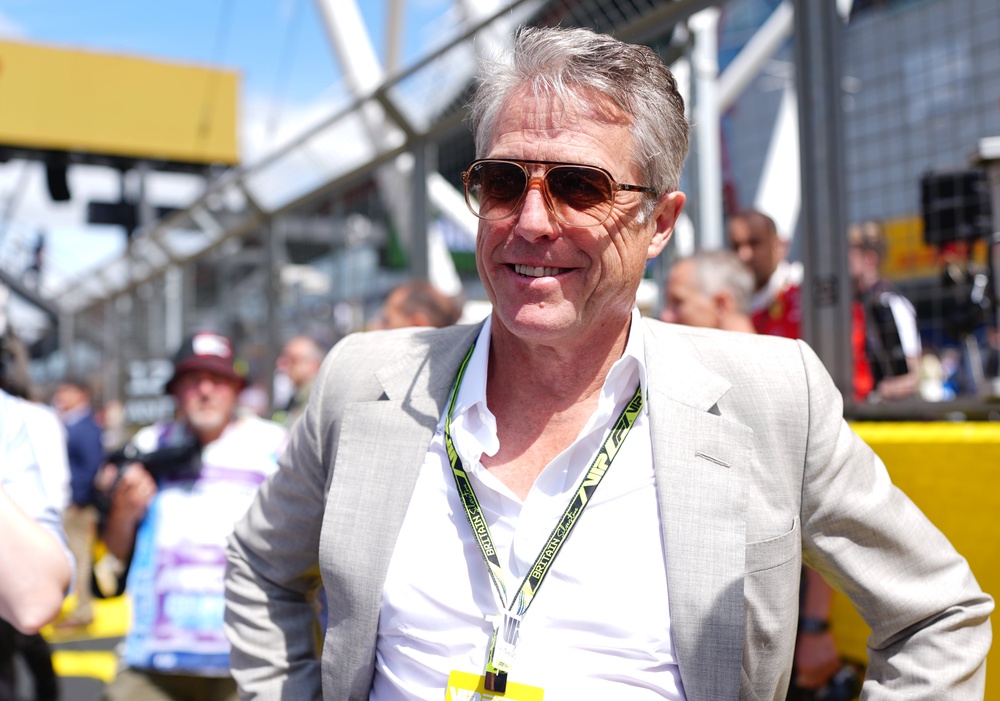 Hugh Grant at Silverstone (PA)