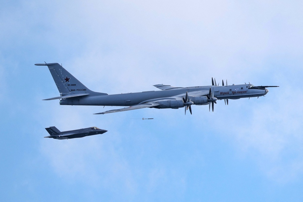 The Bear-F, a plane which can be used for reconnaissance or as a bomber, is believed to have dropped tens of sonobuoys into the waters near the Prince of Wales (MoD/Crown Copyright)