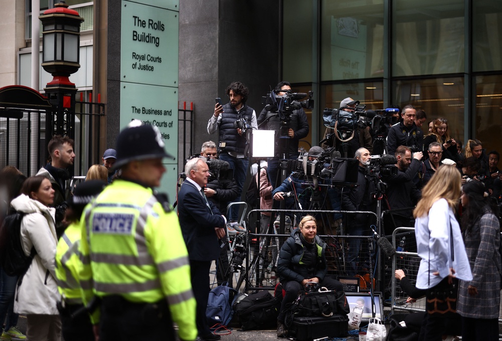 The press turned out in force for the appearance of Harry at the Royal Courts of Justice (AFP/Getty)