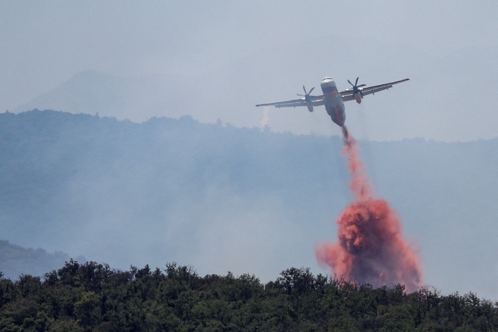 Wildfire burns in Ille-sur-Tet near Bouleternere (Reuters)