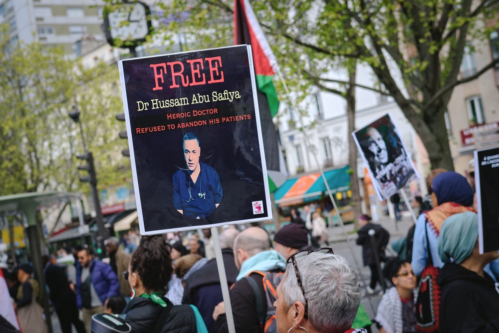 A banner reading Free Hussam Abu Safiya during a pro Palestine demonstration in Paris (AFP/Getty)