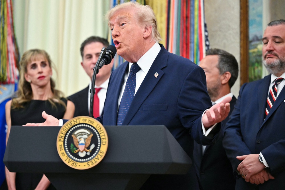 Trump spoke about his family's income on Monday as he attended a White House event for the launch of tax-free investment accounts for children (AFP/Getty)