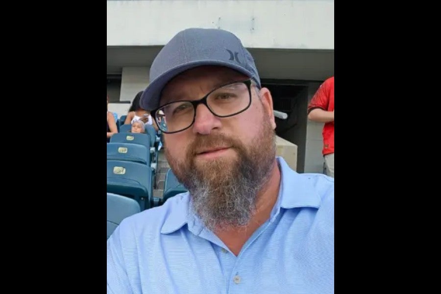 Andrew Schafer served as a police officer for more than two decades. He died last year at 51 following a brain cancer diagnosis in 2023 (Givnish Funeral Home)