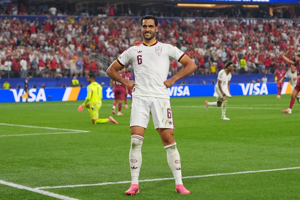 Mikel Merino celebrates his late winner for Spain (AP)