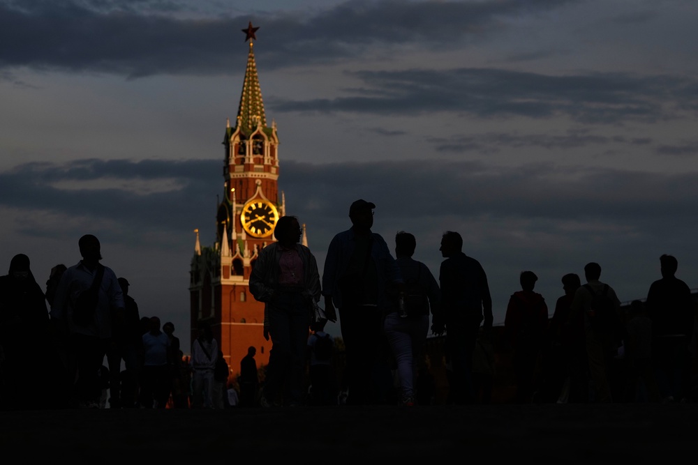 People walk through Red Square in Moscow (AP)