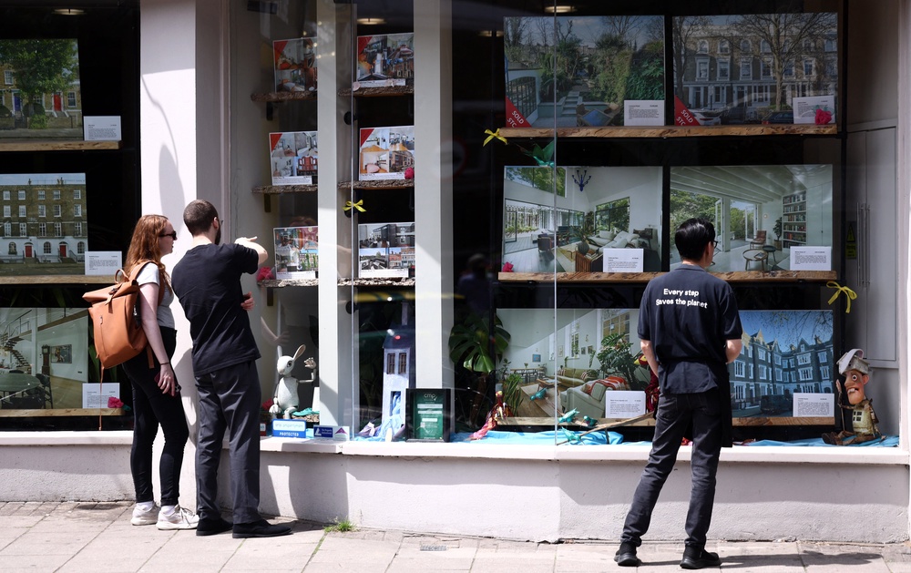 Property values rose by 0.2 per cent month on month typically in June, marking the first monthly increase since February, Lloyds said (AFP/Getty)
