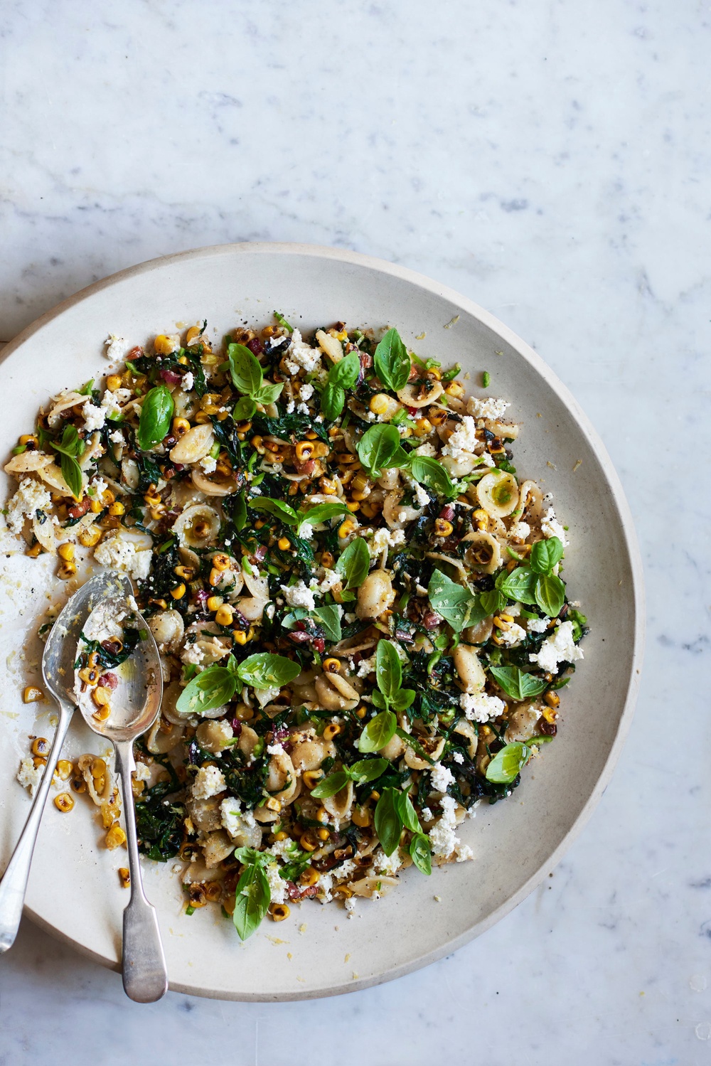 Sweetcorn, chilli, ricotta and basil make this summer pasta bright, creamy and just punchy enough (Issy Croker)