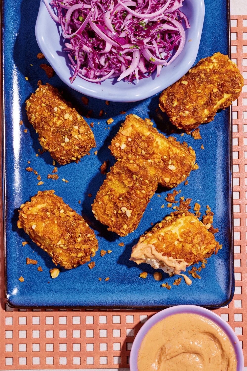 Crispy, satay-style tofu gets its crunch from peanuts and cornflakes (Ellis Parrinder)