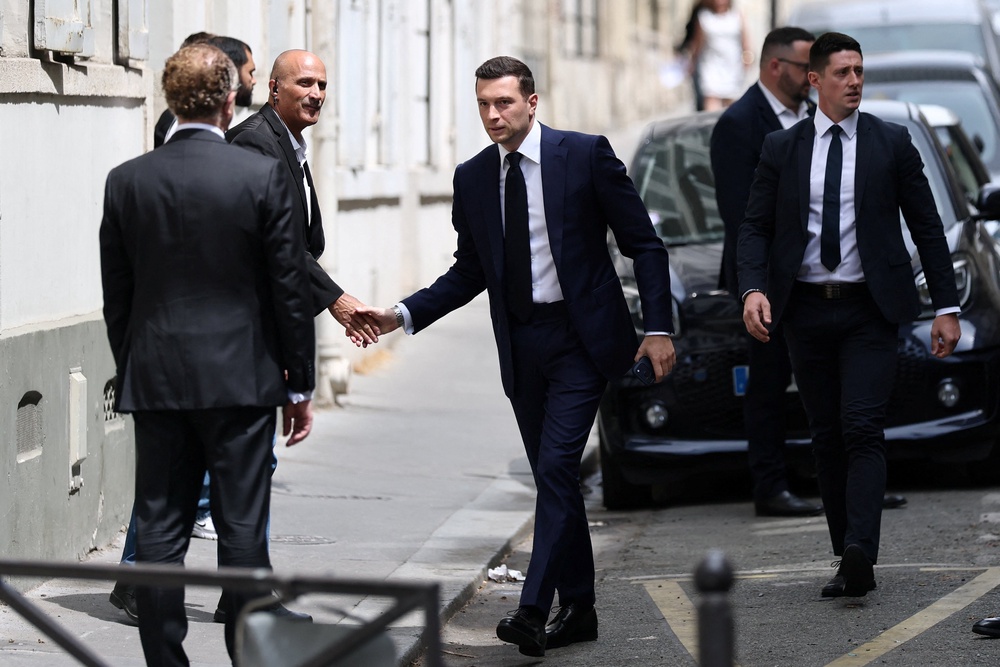 Jordan Bardella, president of the French far-right Rassemblement National (National Rally - RN) political party, arrives at the Rassemblement National headquarters (Reuters)