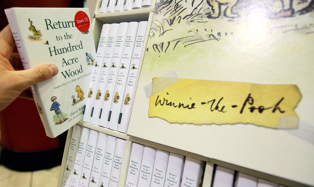 Copies of a new Winnie-the-Pooh book entitled 'Return To The Hundred Acre Wood.’ (AFP/Getty)
