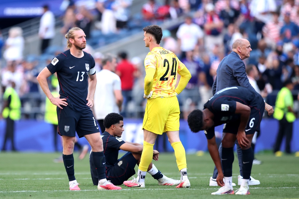 The U.S. men’s national team reflect after Belgium knocked them out of the 2026 World Cup tournament (Getty)